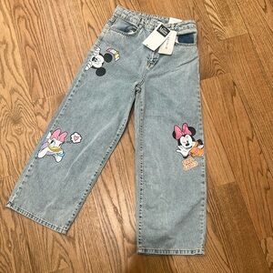 On trend wide leg Disney print jeans